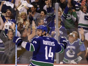 Alex Burrows celebrates scoring against the Boston Bruins in Game 2 of the 2011 Stanley Cup final.