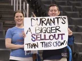 Oklahoma City Thunder fans react to Golden State Warriors' Kevin Durant before a NBA game at the Chesapeake Energy Arena earlier this month in Oklahoma City, Oklahoma. This was his Durant's game in OKC since leaving the team for the Warriors.