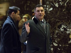 (FILES) This file photo taken on December 16, 2016 shows Vincent Viola as he arrives at Trump Tower for meetings with President-elect Donald Trump in New York.  President-elect Donald Trump announced on December 19, 2016 that he attends to nominate former US Army infantry officer and businessman Vincent Viola as Secretary of the Army. /