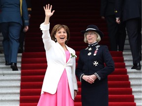 British Columbia's Lieutenant Governor Judith Guichon, right, and Premier Christy Clark look on from the steps of the Legislature Building before the start of the speech from the throne Tuesday, February 14, 2017 in Victoria.