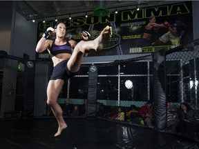 Julia Budd shows a kick in the fight ring at Gibson's MMA in Port Moody last month.