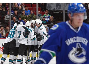 VANCOUVER, BC - FEBRUARY 2: Chris Tierney #50 of the San Jose Sharks celebrates his goal with teammates during their NHL game against the Vancouver Canucks at Rogers Arena February 2, 2017 in Vancouver, British Columbia, Canada.