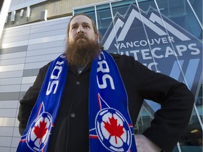 Peter Czimmermann, president of the Vancouver Whitecaps Southsiders, a group of dedicated soccer fans who have cancelled bus trips to the U.S because of the Trump travel ban, outside of B.C.Place Stadium in Vancouver on Wednesday. Mark van Manen/PNG