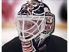 Corey Hirsch wore several distinctive masks during his time minding the cage in Vancouver.