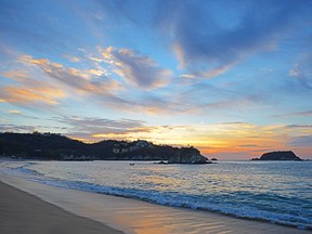 Sunrise in Tangolunda Bay in Huatulco, Mexico.