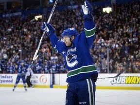 FILE - In this Sunday, Feb. 19, 2017, file photo, Vancouver Canucks' Jannik Hansen, of Denmark, celebrates his goal against the Philadelphia Flyers during the second period of an NHL hockey game in Vancouver, British Columbia. The San Jose Sharks have acquired Hansen from the Canucks late Tuesday, Feb. 28, 2017, for prospect Nikolay Goldobin and a conditional draft pick. (Darryl Dyck/The Canadian Press via AP, File)