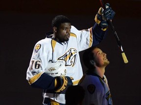 Nashville Predators&#039; P.K. Subban salutes fans of his former team prior to facing the Montreal Canadiens in NHL hockey action, in Montreal on Thursday, March 2, 2017. THE CANADIAN PRESS/Paul Chiasson