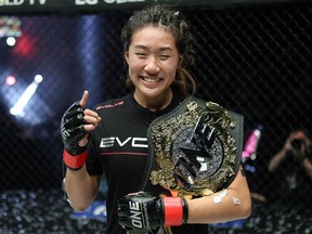 Vancouver-born (Unstoppable) Angela Lee defeats Japan's Mei Yamaguchi to win ONE Championship's inaugural atomweight (115-pound) world title in Singapore on May 6, 2016.