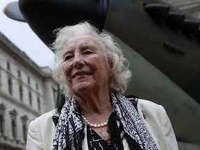 FILE - In this Friday Aug. 20, 2010 file photo, Dame Vera Lynn attends a ceremony to mark the 70th anniversary of the Battle of Britain. in central London. Britain has taken a nostalgic trip into the past on Monday March 20, 2017, to celebrate the 100th birthday of patriotic songstress Vera Lynn by projecting her image onto the white cliffs of Dover. (AP Photo/Lefteris Pitarakis, File)