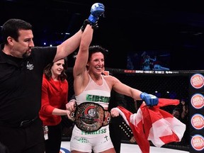 Julia Budd of Port Moody, B.C, celebrates after beating Marloes Coenen, of the Netherlands, during the inaugural women&#039;s featherweight championship fight at Bellator 174 in Thackerville, Okla., on March 3, 2017. THE CANADIAN PRESS/HO - Bellator, Eric Coleman *MANDATORY CREDIT*