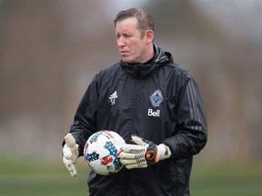 Vancouver Whitecaps&#039; goalkeeper coach Stewart Kerr looks on during MLS soccer practice in Vancouver, B.C., on Wednesday March 22, 2017. THE CANADIAN PRESS/Darryl Dyck