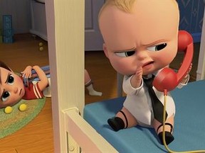 This image released by DreamWorks Animation shows characters Tim, voiced by Miles Bakshi, and Boss Baby, voiced by Alec Baldwin in a scene from the animated film, &ampquot;The Boss Baby.&ampquot; (DreamWorks Animation via AP)