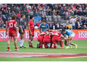 Pat Kay #10 and Nathan Hirayama #9 of Canada stand outside the scrum against Argentina during day 2 of the 2017 Canada Sevens Rugby Tournament on March 12, 2017 in Vancouver, British Columbia, Canada.