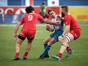 The Canadian men's team has suffered some lopsided losses in Singapore.