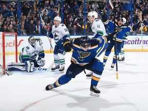 Magnus Paajarvi of the Blues celebrates after scoring one of his two goals against the Canucks.