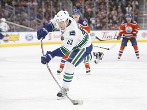 Vancouver Canucks' Bo Horvat (53) takes a shot on the Edmonton Oilers' net during third period NHL hockey action in Edmonton on Saturday, March 18, 2017. The Oilers won 2-0.