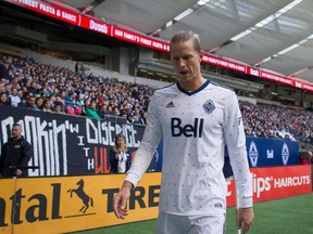 Vancouver Whitecaps' Brek Shea walks off the field after being sent off during second half MLS soccer action against the Toronto FC, in Vancouver, B.C., on Saturday, March 18, 2017.