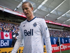 Whitecaps Brek Shea walks off the pitch after being ejected during second-half MLS action against Toronto FC in Vancouver on March 18.