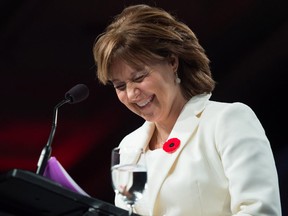 Christy Clark laughs while delivering a keynote address at the B.C. Liberal Party convention at Vancouver in November 2016. Maybe she's smiling because of her rich future MLA's pension, one reader says.