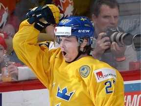 Sweden's Jonathan Dahlen celebrates his goal against Russia during the bronze-medal game at the IIHF World Junior Championship on Jan. 5 in Montreal. With their hopes of making this year's playoffs hovering between slim and none, the Vancouver Canucks have turned their focus to the future by trading two of their veteran players, Jannik Hansen and Alex Burrows, for prospects, including Dahlen.