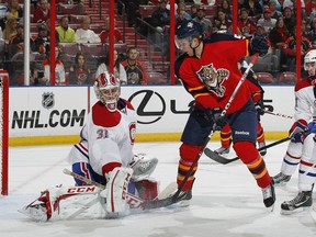 SUNRISE, FL - FEBRUARY 14:  Goaltender Carey Price #31 of the Montreal Canadiens stops a shot by Drew Shore #50 of the Florida Panthers at the BB&T Center on February 14, 2013 in Sunrise, Florida.