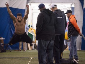 SFU's Jordan Herdman runs through drills at a Pro Day at the North Shore bubble complex in North Vancouver earlier this month.