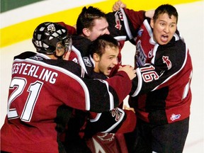 Vancouver Giants, left to right, Brett Festerling, golie Tyson Sexsmith, Michal Repik and Wacey Rabbit celebrate their 3-1 win over the Medicine Hat Tigers, to win the 2007 Memorial Cup final at the PNE Coliseum on Sunday afternoon.