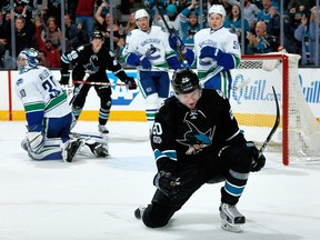 Marcus Sorensen of the Sharks celebrates scoring his first NHL goal — and game winner —during the second period against the Canucks.