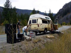 The 1980 Ford Econoline van used by Terry Fox during his Marathon of Hope in 1980 was later bought and used as a touring van by a Vancouver art-metal band called Removal. Pictured here are Removal bassist Rob Clark (black T-shirt) and guitarist Bill Johnston, somewhere along the Trans-Canada Highway in B.C. In 2005. Photo was taken by Removal drummer Ernie Hawkins.
