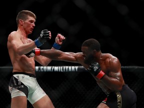 Tyron Woodley (right) fights against Stephen Thompsonin their welterweight championship bout. (Michael Reaves/Getty Images )
