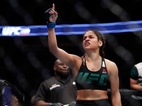 Cynthia Calvillo celebrates her first-round victory over Amanda Cooper in a strawweight bout during UFC 209 at T-Mobile Arena on March 4, 2017 in Las Vegas, Nevada.