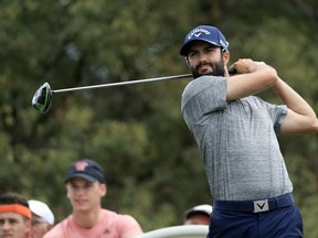 Adam Hadwin hits off the sixth tee during the final round of the Valspar Championship.