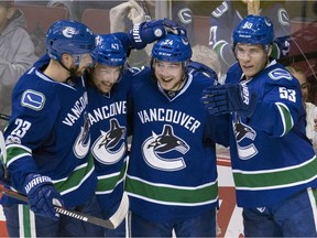 Alex Edler (left) might be the only Canucks veteran outplaying youthful prospects like (from left) Sven Baertschi, Reid Boucher and Bo Horvat.