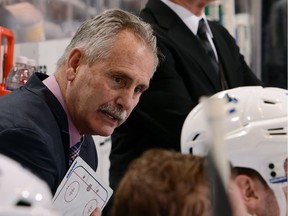 Head coach Willie Desjardins of the Vancouver Canucks looks on against the Coyotes at Gila River Arena on Jan. 26 in Glendale, Ariz.