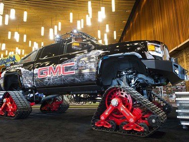 A GMC pickup outfitted with all-terrain threads is on display at the Vancouver Auto Show at Vancouver Convention Centre West, Vancouver March 28 2017.