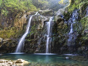Tripple Waterfall called Upper Waikuni Falls or Three Bear Falls of the Wailua Nui Stream along the Road to Hana.