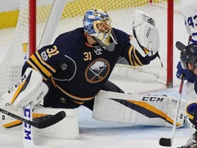 Buffalo Sabres goalie Anders Nilsson (31) makes a glove save during the third period of an NHL hockey game against the Toronto Maple Leafs, Monday, April 3, 2017, in Buffalo, N.Y. (AP Photo/Jeffrey T. Barnes)