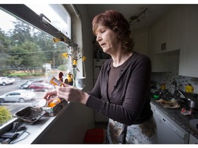 Sandra Hughes of Sooke is among many B.C. pain patients who say they are in constant pain after new guidelines for prescribing opioids cut the recommended amount of medication. Photo: Darren Stone/Victoria Times Colonist