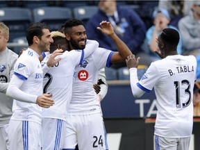 Montreal Impact forward Anthony Jackson-Hamel (24) celebrates with Ballou Tabla (13), Ambroise Oyongo (2) and Ignacio Piatti after scoring a goal against the Philadelphia Union during the second half of an MLS soccer match last week in Chester, Pa. The match ended in a 3-3 draw.