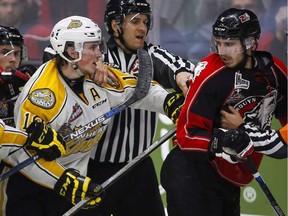Brandon Wheat King Nolan Patrick (left, taking issue with the Rouyn-Noranda Huskies' Anthony-John Greer during last year’s Memorial Cup championship tournament), is the NHL Central Scouting Bureau’s top-ranked skater for this summer’s draft.