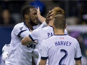 Kendal Waston and Tim Parker get extra-exuberant celebrating last week's Whitecaps win over the Seattle Sounders.