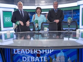 From left, B.C. NDP Leader John Horgan, Liberal Leader Christy Clark and B.C. Green party Leader Andrew Weaver pose for a photo following the leaders' debate in Vancouver on Thursday.