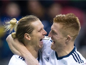 Vancouver Whitecaps' Brek Shea, left, and Tim Parker celebrate Shea's goal during first half, second leg, CONCACAF Champions League soccer semifinal action against Tigres UANL, in Vancouver, B.C., on Wednesday, April 5, 2017.