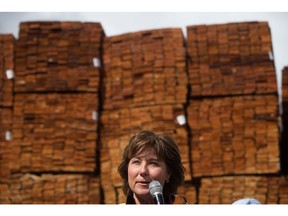 Liberal Leader Christy Clark campaigns monday at CedarLine Industries, a manufacturer of western red cedar products, in Surrey.