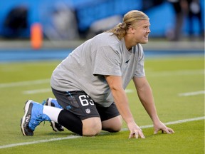 Carolina Panthers tackle David Foucault stretches prior to an NFL football game against the New Orleans Saints in Charlotte, N.C., on Oct. 30, 2014. After two seasons in Carolina where he mostly practised that was followed by another spent by the phone waiting for another NFL shot, lineman David Foucault is eager to get back on the field, this time with the CFL's B.C. Lions.