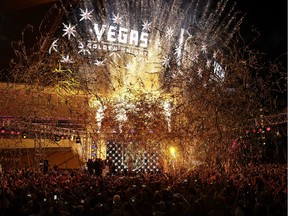 FILE - In this Nov. 22, 2016, file photo, confetti streams above the crowd during an event to unveil the name of Las Vegas' National Hockey League franchise in Las Vegas. The team will be called the Vegas Golden Knights.