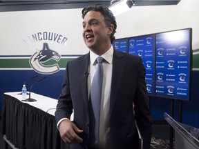 Vancouver Canucks new head coach Travis Green talks to the media after a news conference at Rogers Arena on Wednesday.