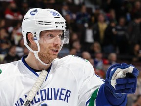 Jannik Hansen did his best to point the Canucks in the right direction. (Getty Images).