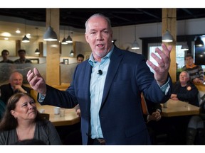 NDP Leader John Horgan speaks about details of the party's election platform after its release during a campaign stop at an Italian restaurant in Coquitlam, B.C., on Thursday April 13, 2017. A provincial election will be held on May 9.