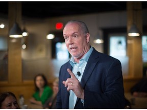 NDP leader John Horgan makes a campaign stop at an Italian restaurant in Coquitlam.